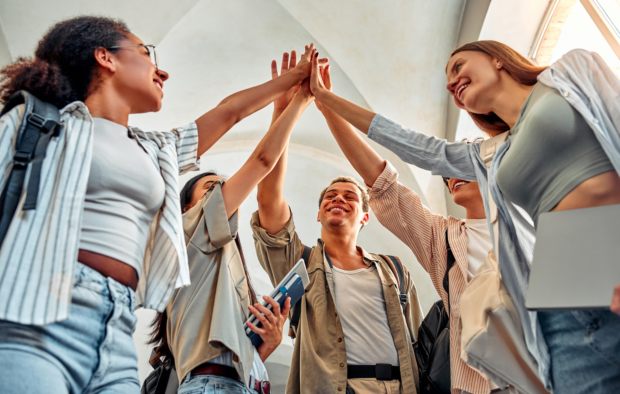 Students doing a high-five